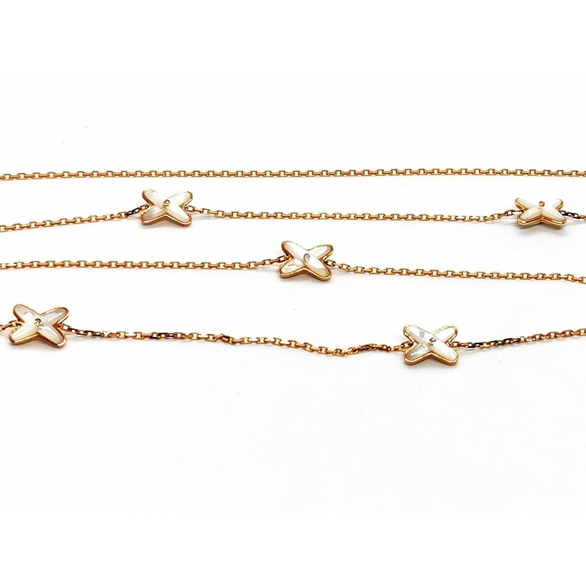 Collier Sautoir CHAUMET "Jeux de liens" en or rose, nacre et diamants - Castafiore