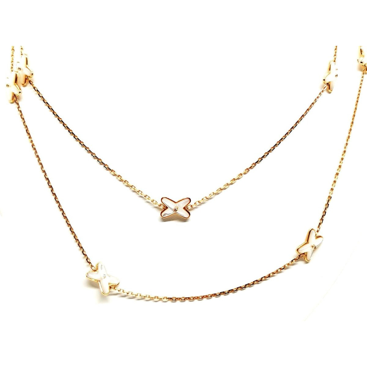 Collier Sautoir CHAUMET "Jeux de liens" en or rose, nacre et diamants - Castafiore
