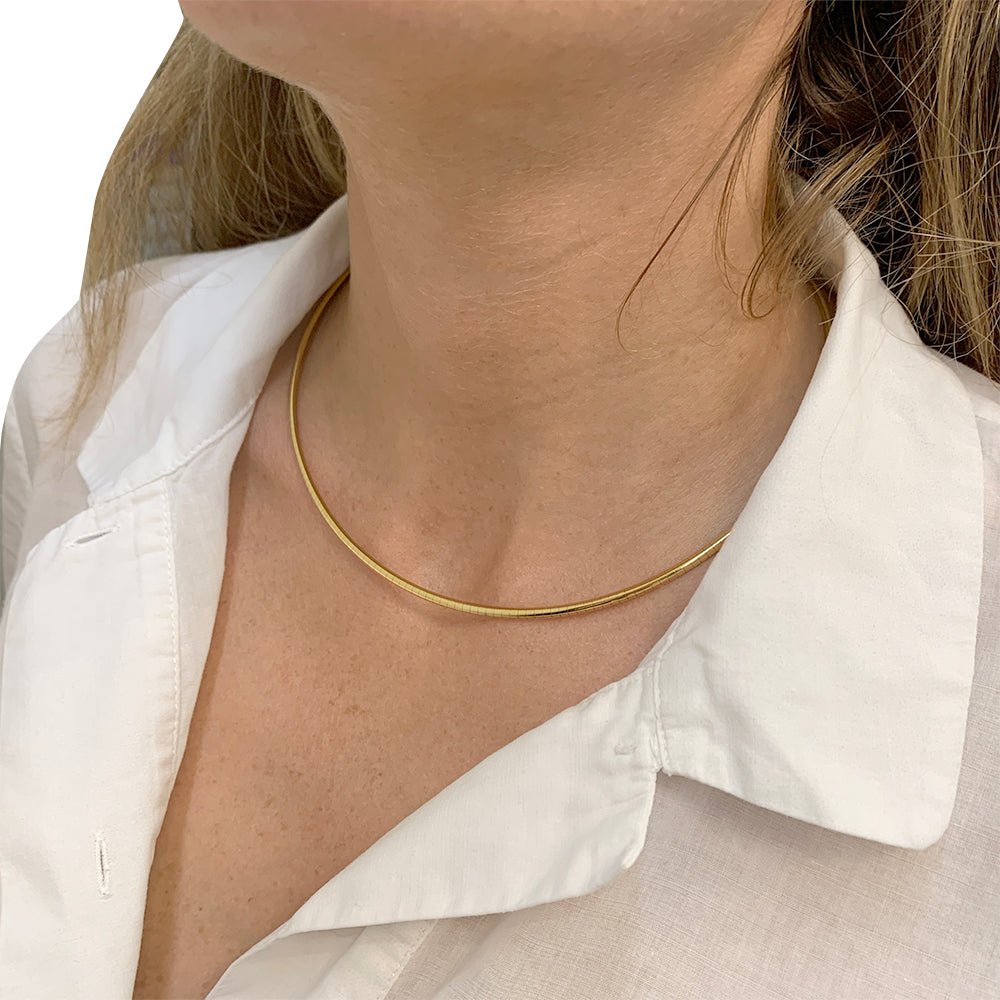 Collier Stern omega or jaune, diamants - Castafiore