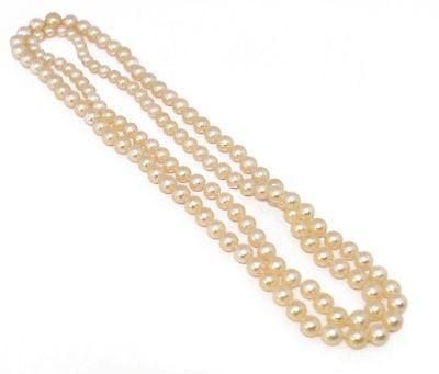 Long sautoir en Perles blanches Akoya. - Castafiore