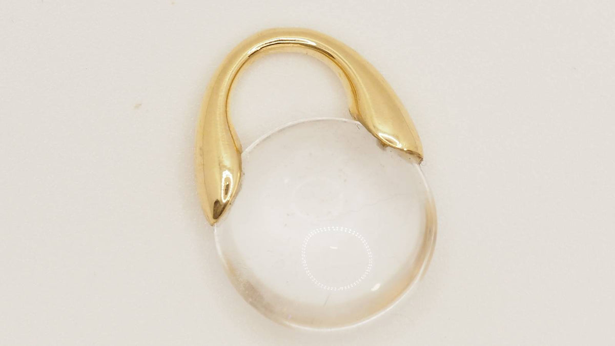 Pendentif Pomellato en or jaune et cristal