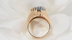 Bague en or jaune et topaze bleue