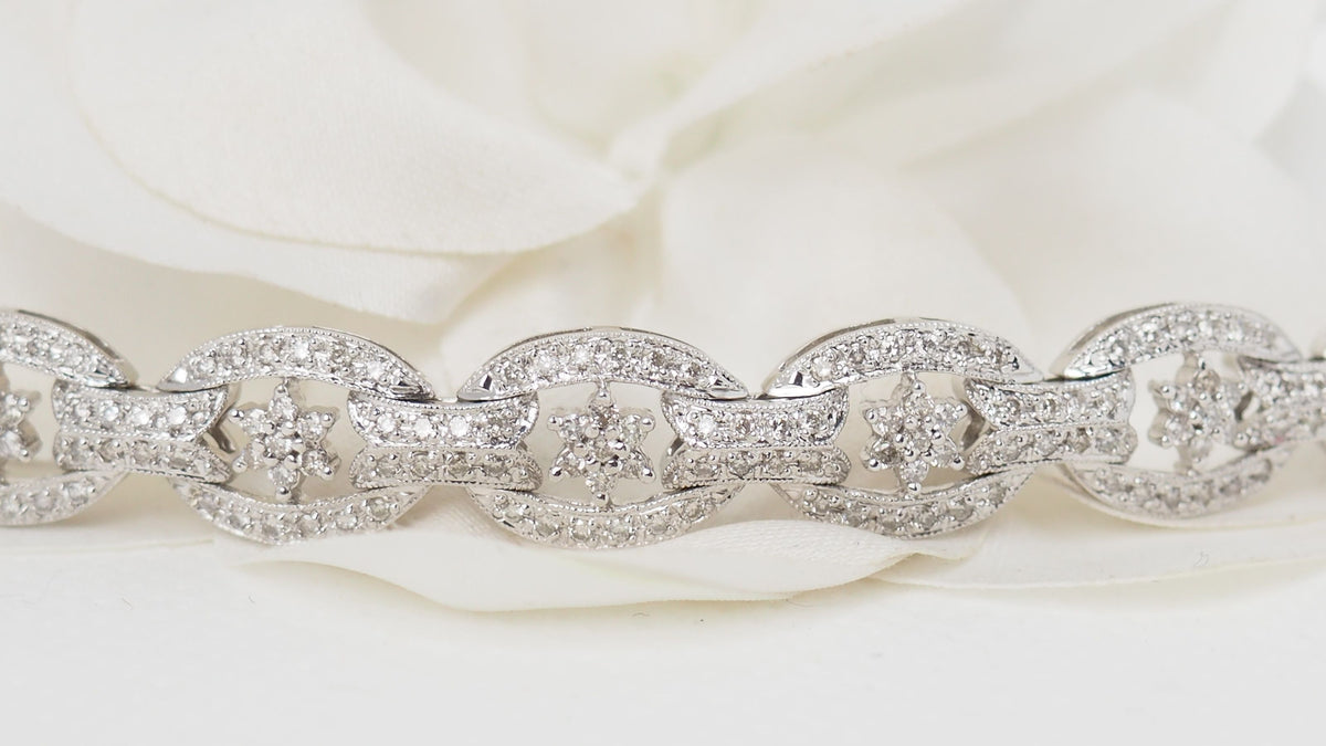 Bracelet ajouré en or blanc et diamants