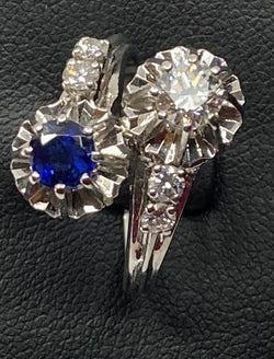 Ring in 18 carat gold, you and me in diamonds and Sapphire