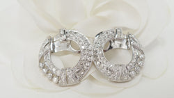 Boucles d'oreilles en or blanc et diamants
