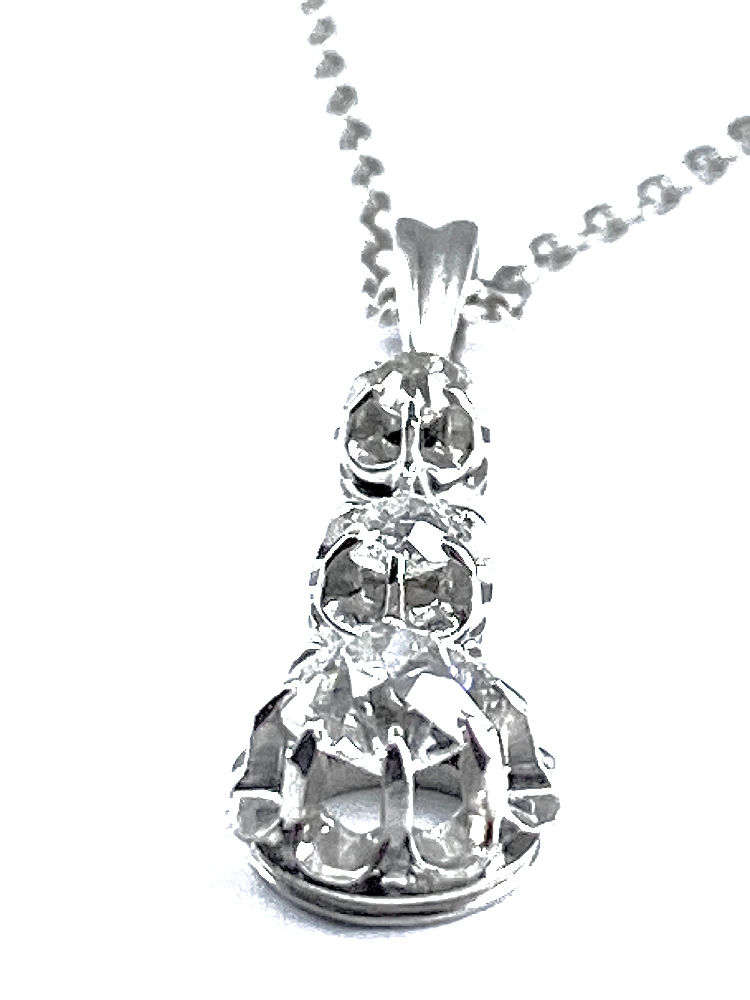 Pendentif en or blanc et diamants