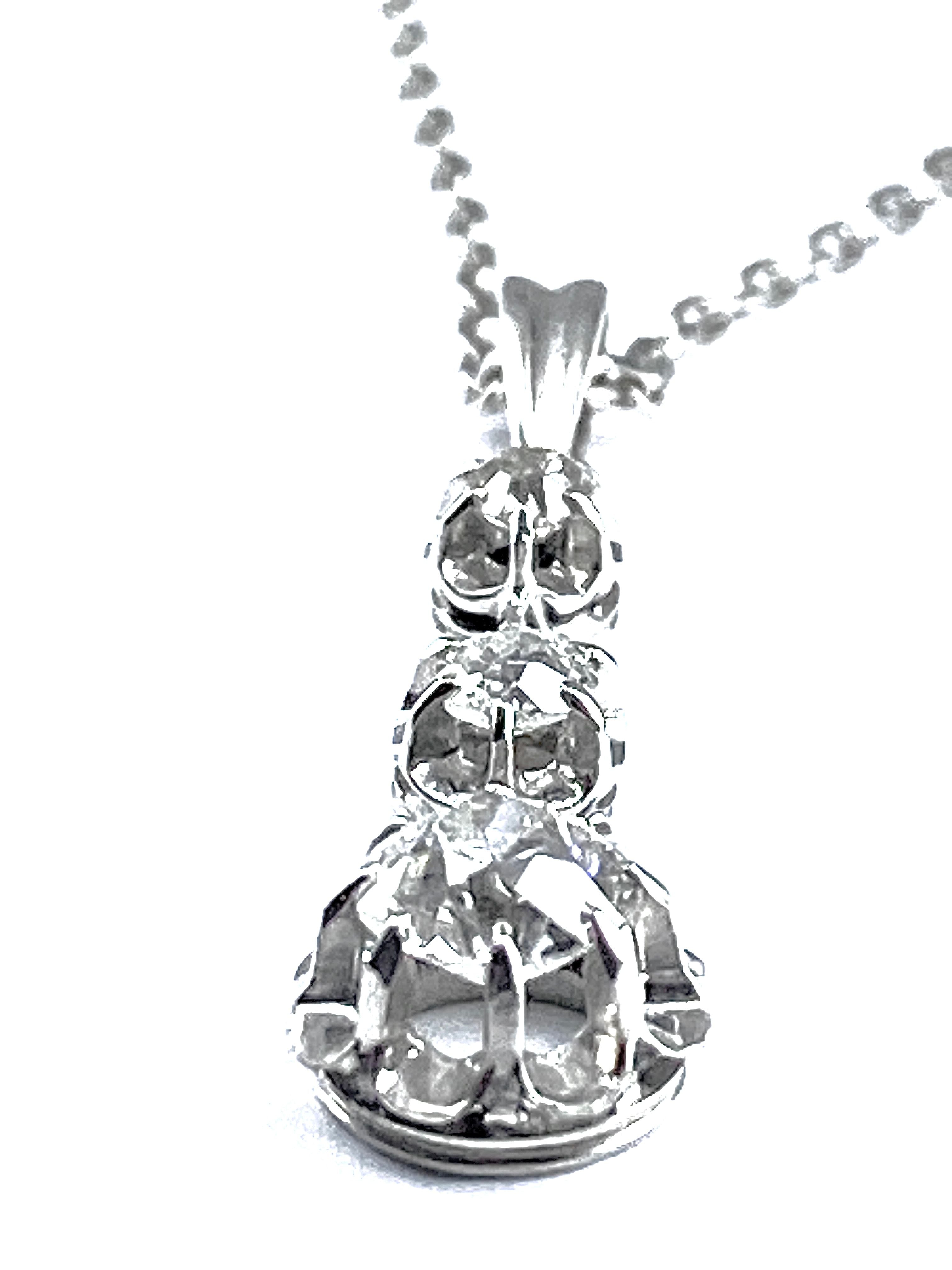 Pendentif en or blanc et diamants