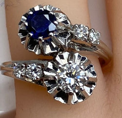 Ring in 18 carat gold, you and me in diamonds and Sapphire