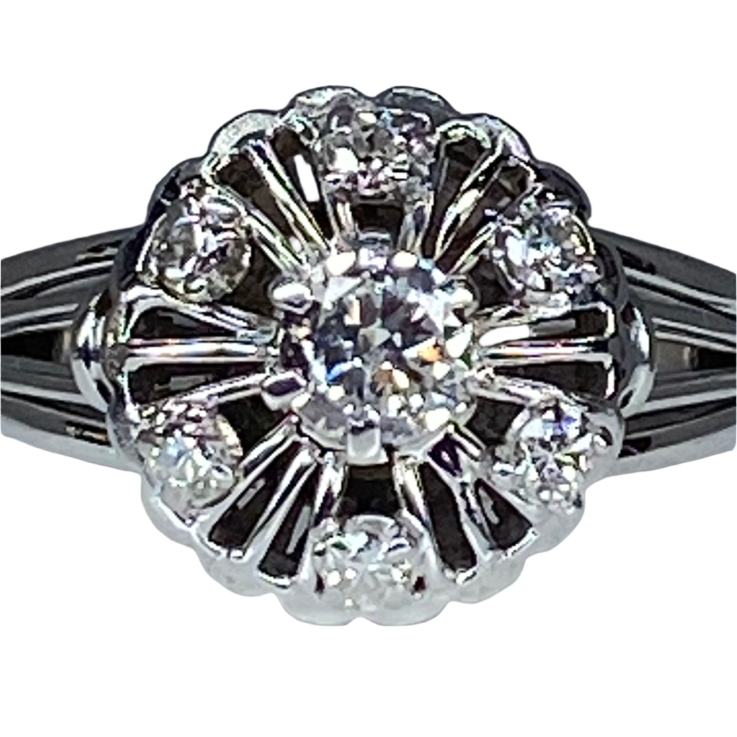 Bague ronde en or 18 carats marguerite sertie de 7 diamants de taille brillant