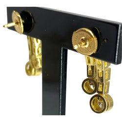 Boucles d’oreilles en or 18 carats en diamants baguettes et diamants ronds