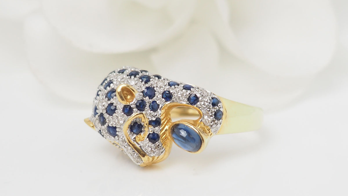 Bague Panthère en or jaune, saphirs et diamants