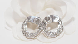 Boucles d'oreilles en or blanc et diamants