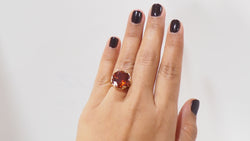 Bague vintage en or rose et saphir orange
