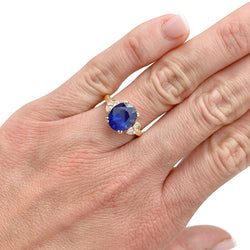 MAUBOUSSIN ring, centered with an oval sapphire framed by diamonds