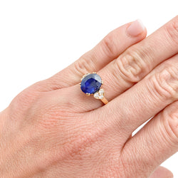 MAUBOUSSIN ring, centered with an oval sapphire framed by diamonds