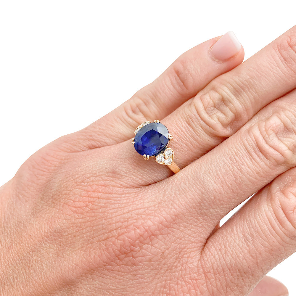 MAUBOUSSIN ring, centered with an oval sapphire framed by diamonds