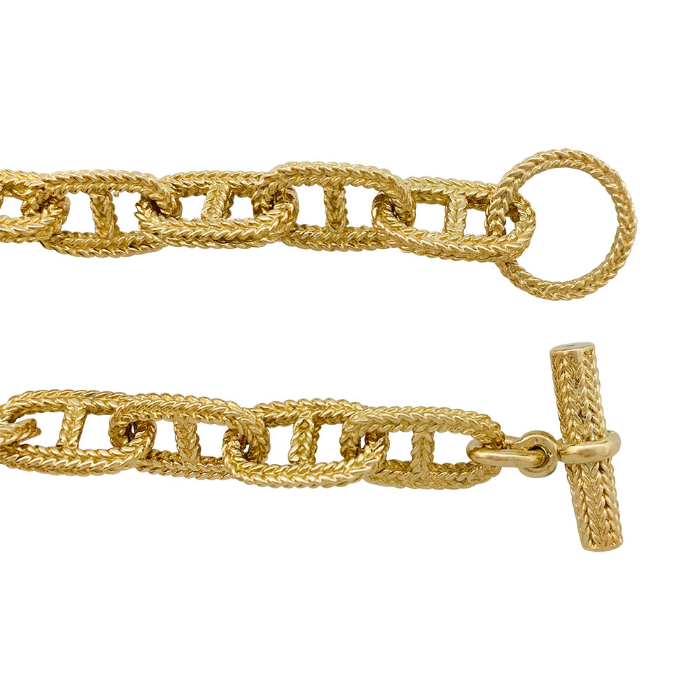 Yellow gold bracelet, navy mesh