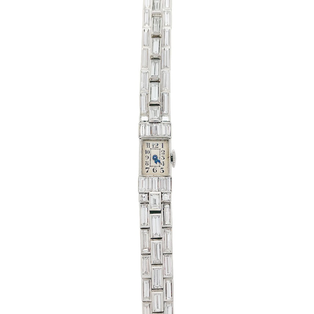 Montre Art Déco en platine et diamants. - Castafiore