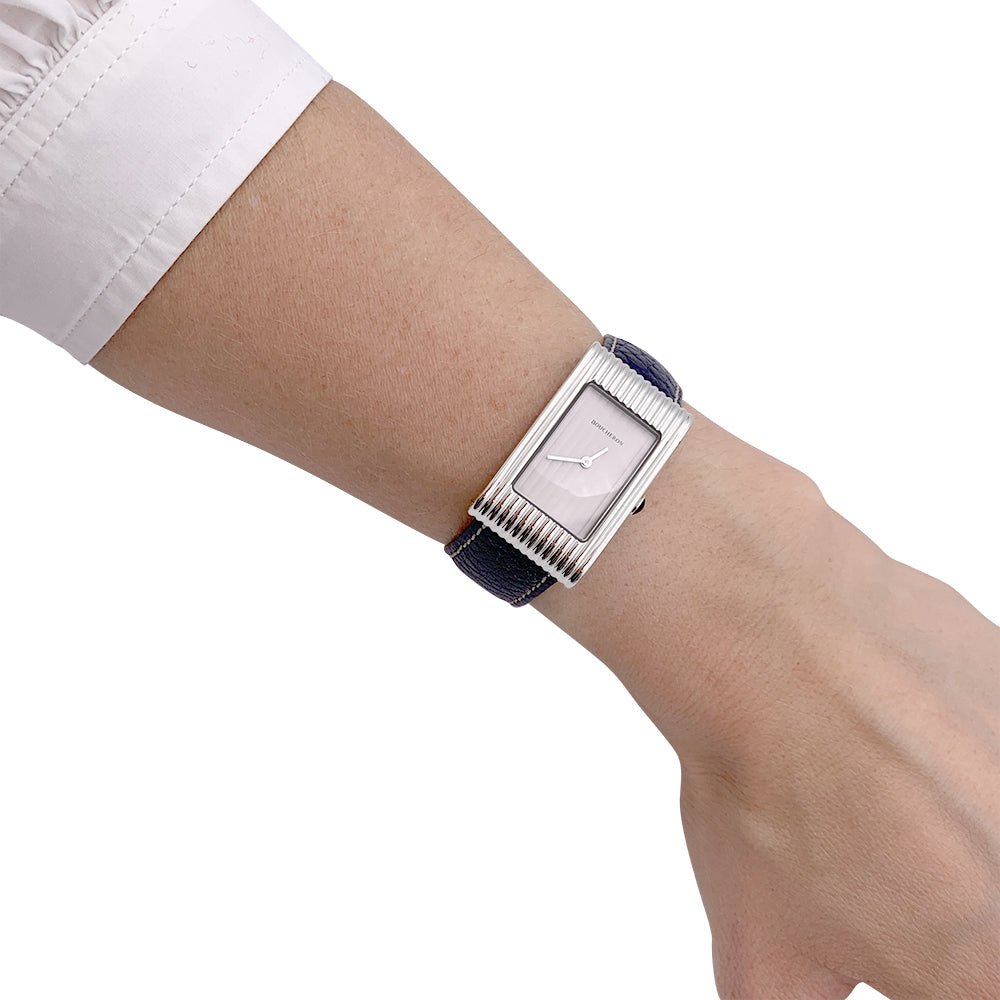 Montre Boucheron, "Reflet", acier, cuir. - Castafiore