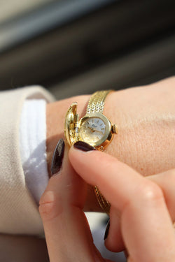Montre BUCHERER dame à secret, en or jaune - Castafiore