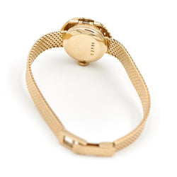 Montre BUCHERER dame à secret, en or jaune - Castafiore