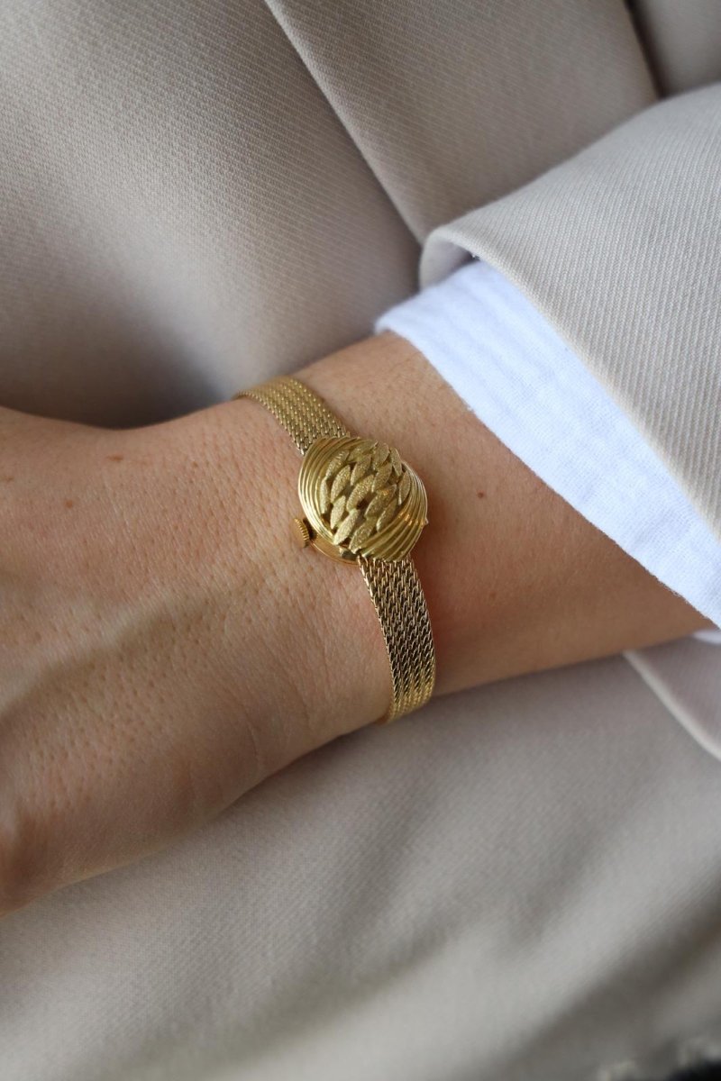 Montre BUCHERER dame à secret, en or jaune - Castafiore