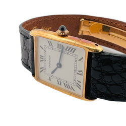 Montre CARTIER, modèle TANK arrondie en or jaune - Castafiore