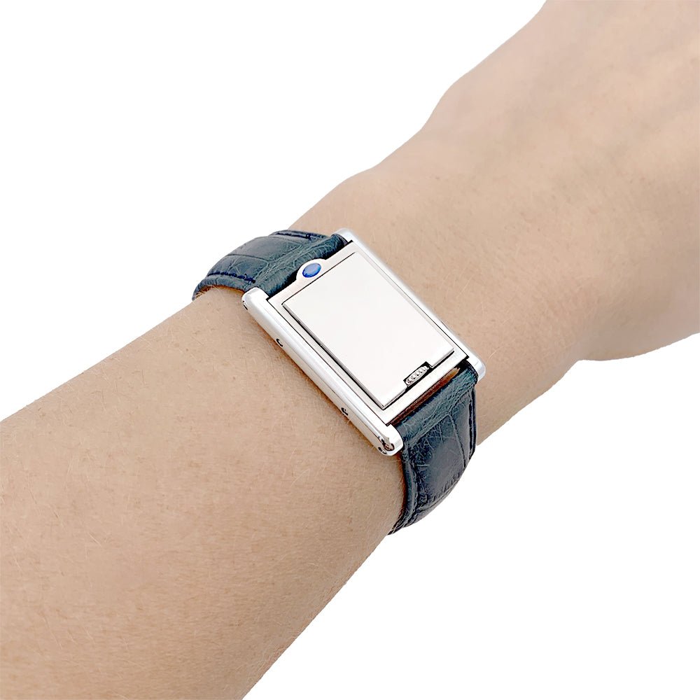 Montre Cartier "Tank basculante" acier, cuir. - Castafiore