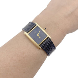 Montre CARTIER "Tank Must" argent plaqué or, cadran laqué bleu. - Castafiore