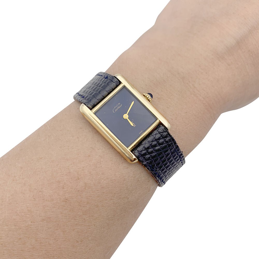 Montre CARTIER "Tank Must" argent plaqué or, cadran laqué bleu. - Castafiore