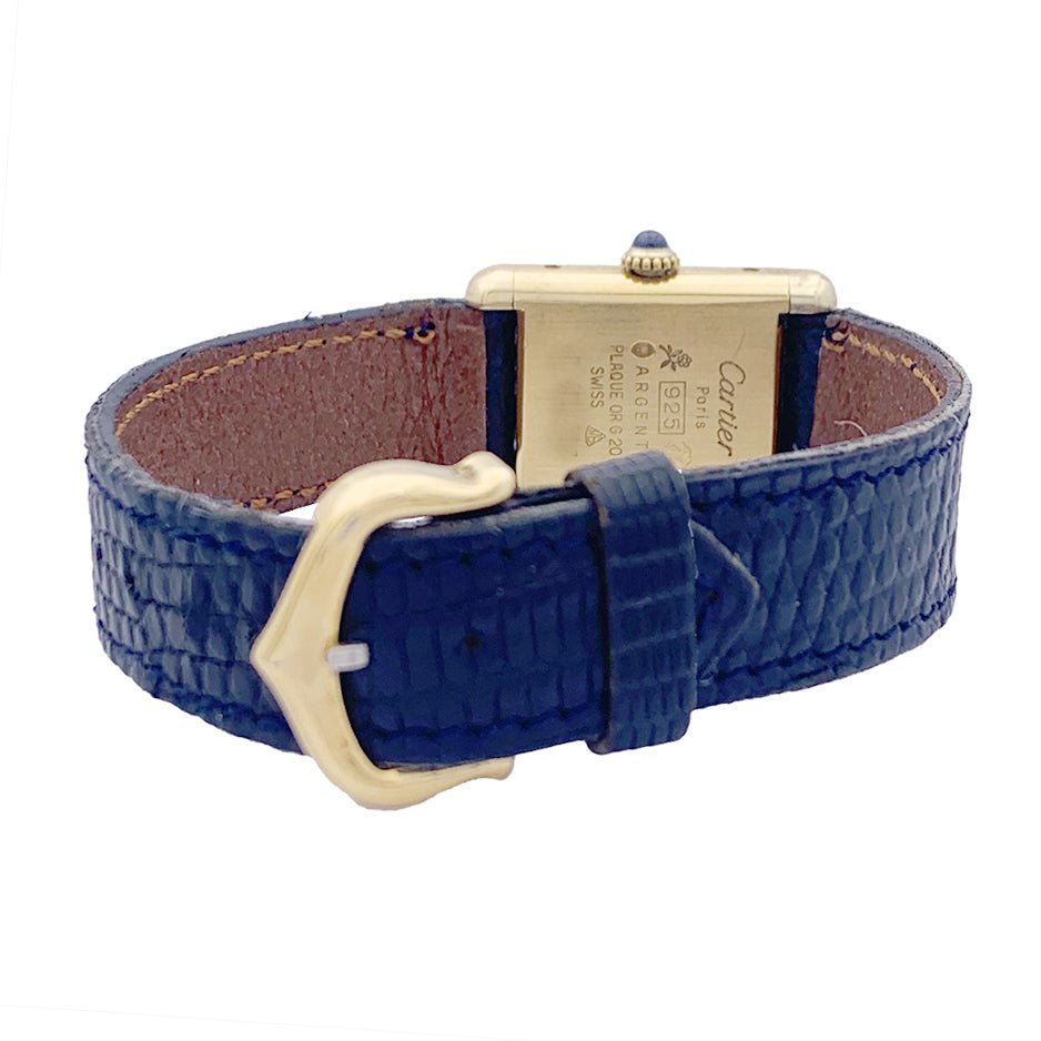 Montre CARTIER "Tank Must" argent plaqué or, cadran laqué bleu. - Castafiore