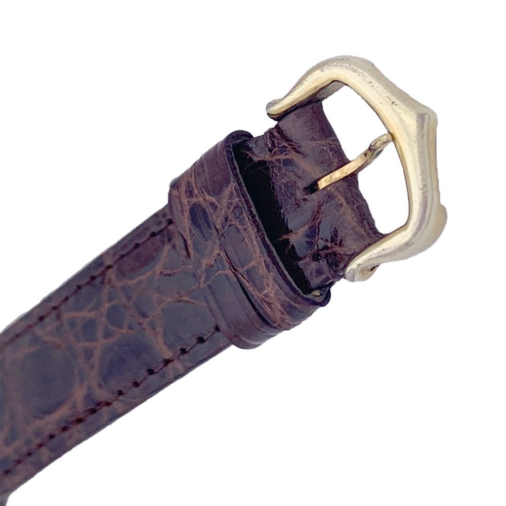 Montre CARTIER "Tank Must" argent plaqué or, cadran laqué marron. - Castafiore