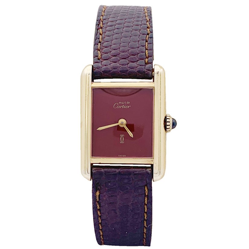 Montre CARTIER "Tank Must" argent plaqué or, cadran laqué rouge. - Castafiore