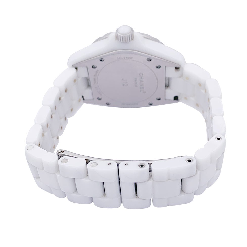 Montre CHANEL "J12" céramique blanche et diamants. - Castafiore