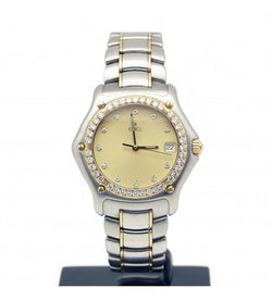 Montre EBEL "Lady" en or jaune, diamants et acier - Castafiore