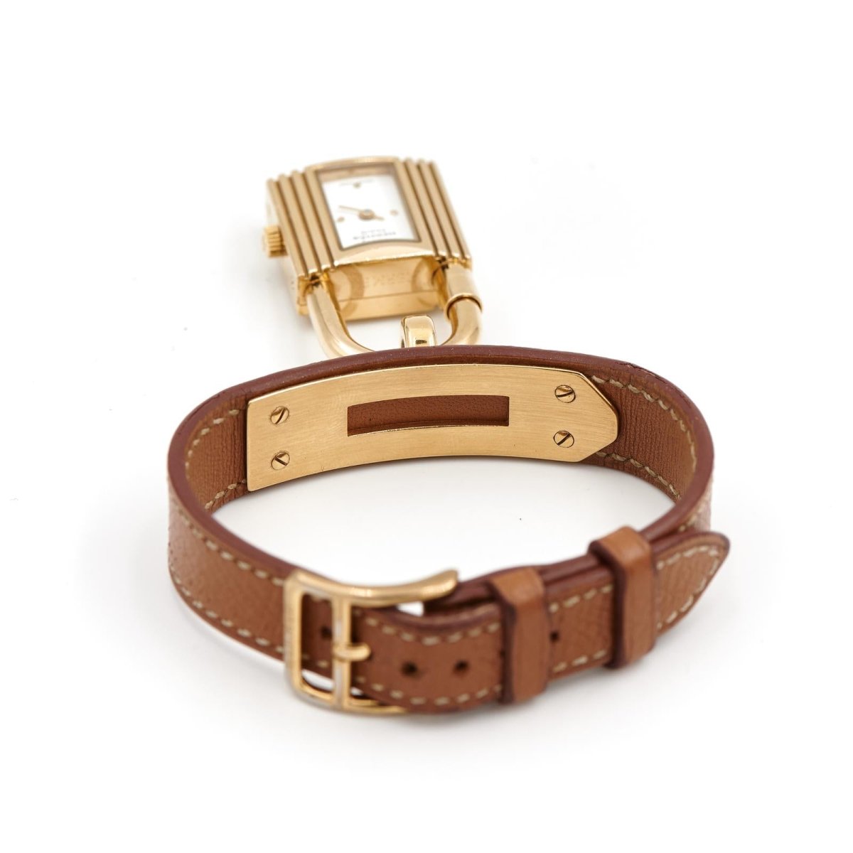 Montre HERMÈS "Kelly" plaqué or et cuir marron - Castafiore