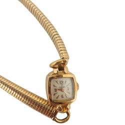 Montre OMEGA en or jaune - Castafiore