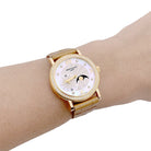 Montre PATEK PHILIPPE "Calatrava Moon Phase" or jaune, nacre, diamants, cuir. - Castafiore