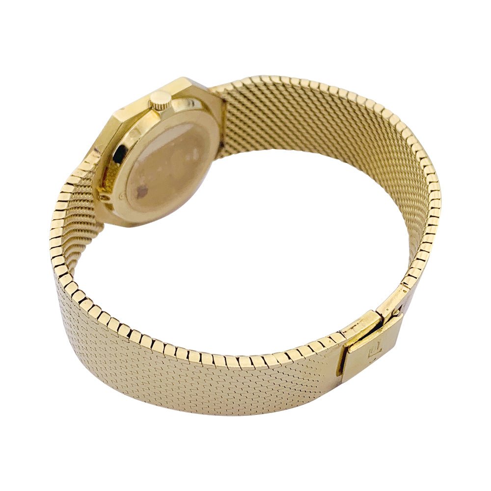 Montre PIAGET en or jaune et malachite - Castafiore