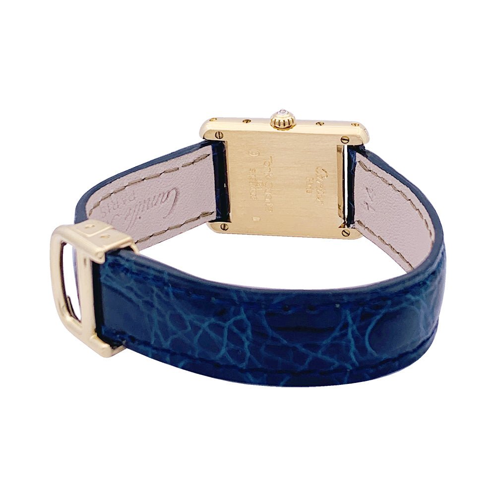 Montre Quartz CARTIER "Tank Louis Cartier" en or jaune, cuir et diamants - Castafiore