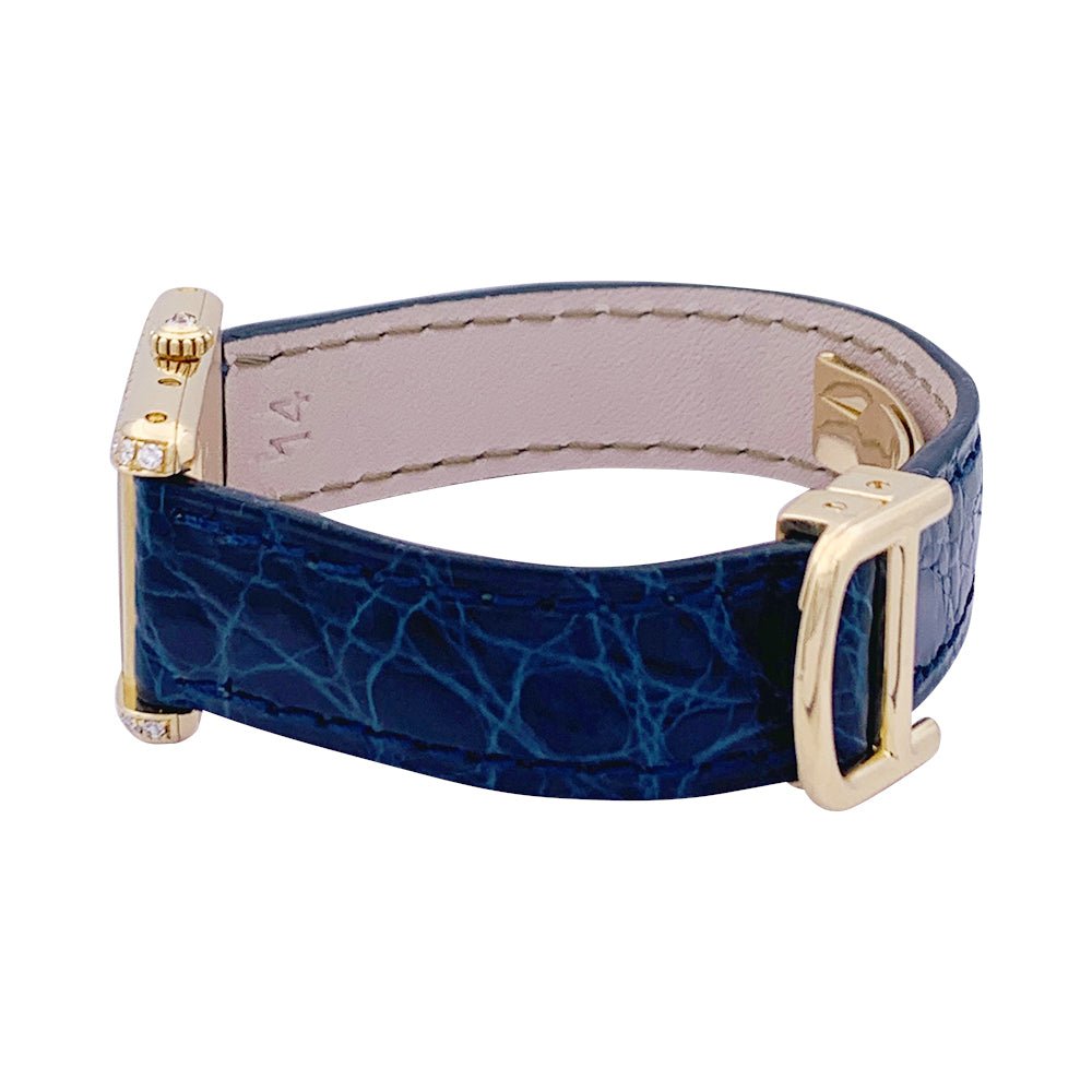Montre Quartz CARTIER "Tank Louis Cartier" en or jaune, cuir et diamants - Castafiore