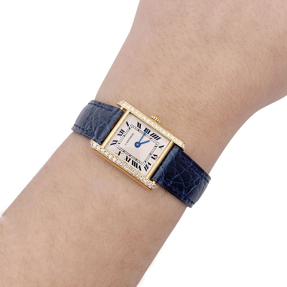 Montre Quartz CARTIER "Tank Louis Cartier" en or jaune, cuir et diamants - Castafiore