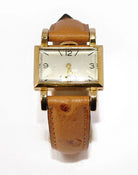 Montre rectangle or jaune 18k mécanique datant vers 1950 - Castafiore