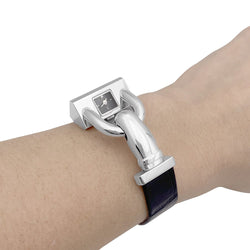 Montre Van Cleef & Arpels, "Cadenas", acier, cuir. - Castafiore