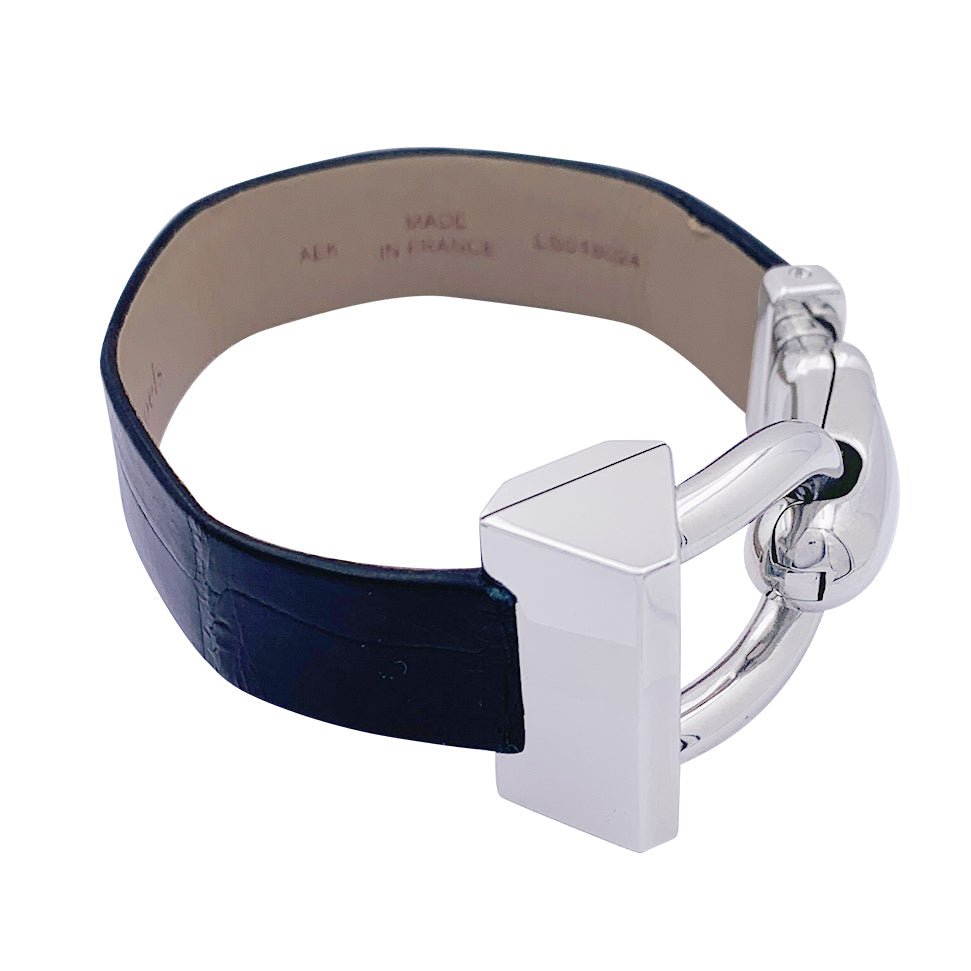 Montre Van Cleef & Arpels, "Cadenas", acier, cuir. - Castafiore