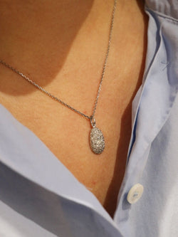 Pendentif ancien ovoide en or blanc et diamants taille ancienne - Castafiore