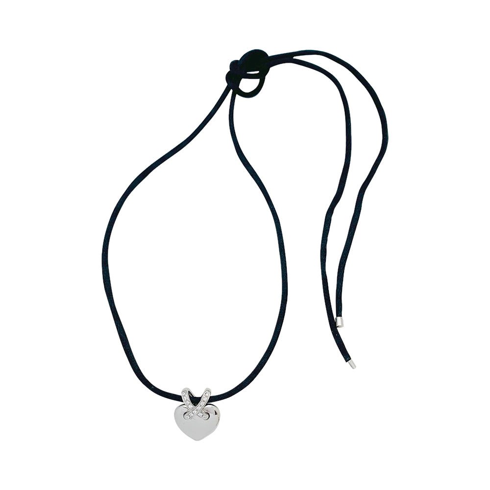Pendentif CHAUMET cœur , collection "Liens", or blanc et diamants - Castafiore