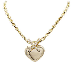 Pendentif Chaumet, collection "Liens", en or jaune et diamants - Castafiore