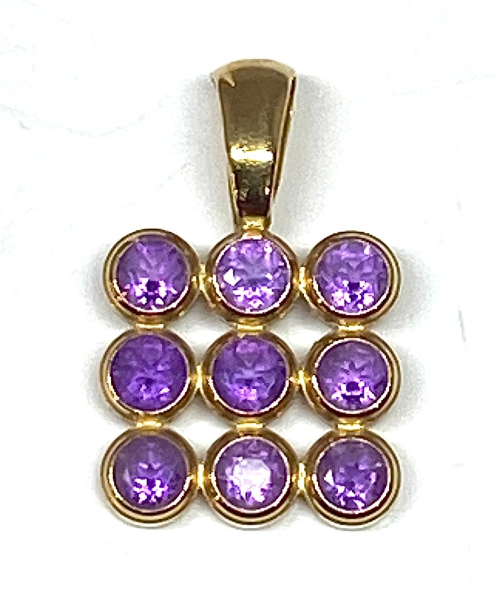 Pendentif en or 18 carats serti de 9 améthystes - Castafiore