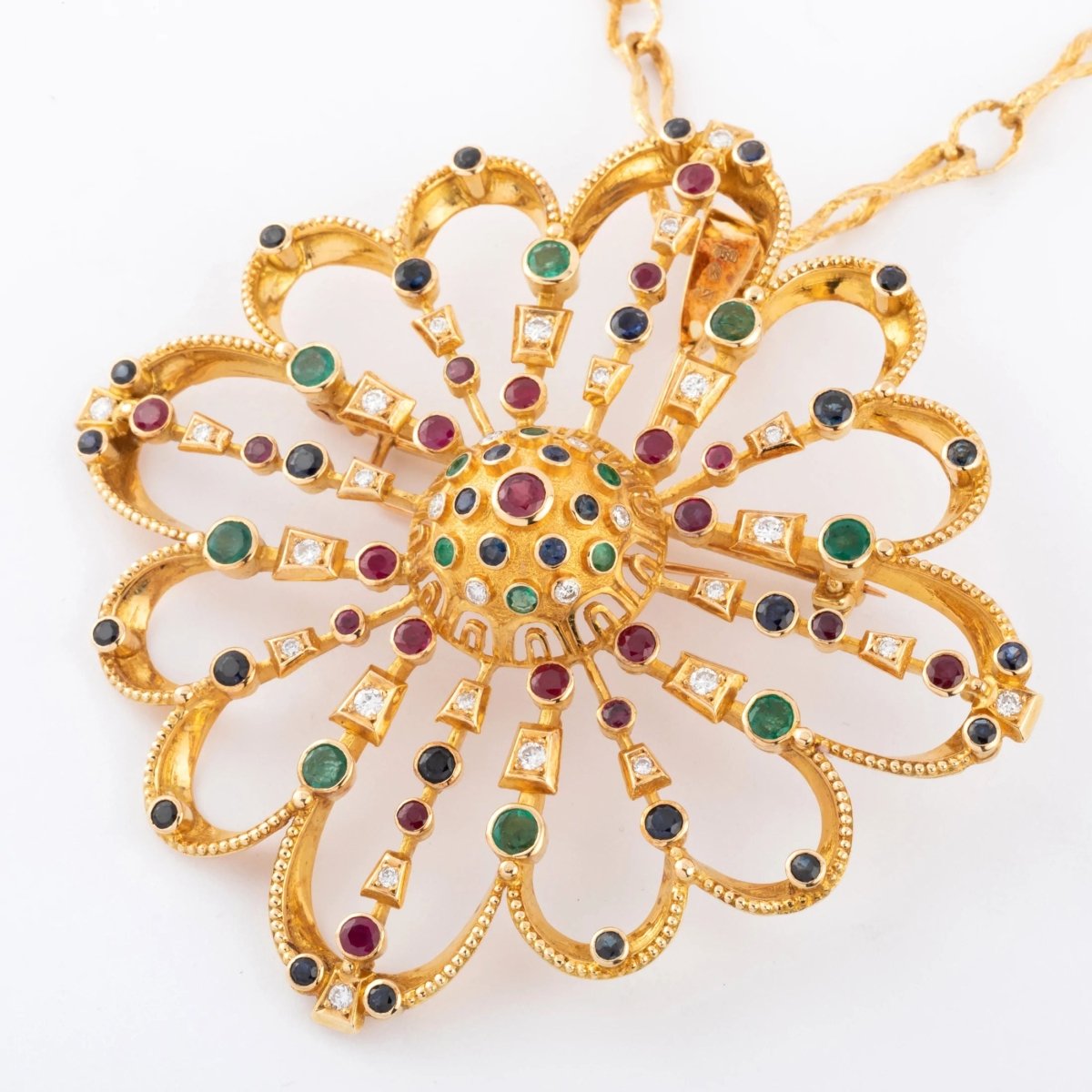 Pendentif et broche or jaune du créateur grec Lalaounis ornée de pierres précieuses - Castafiore